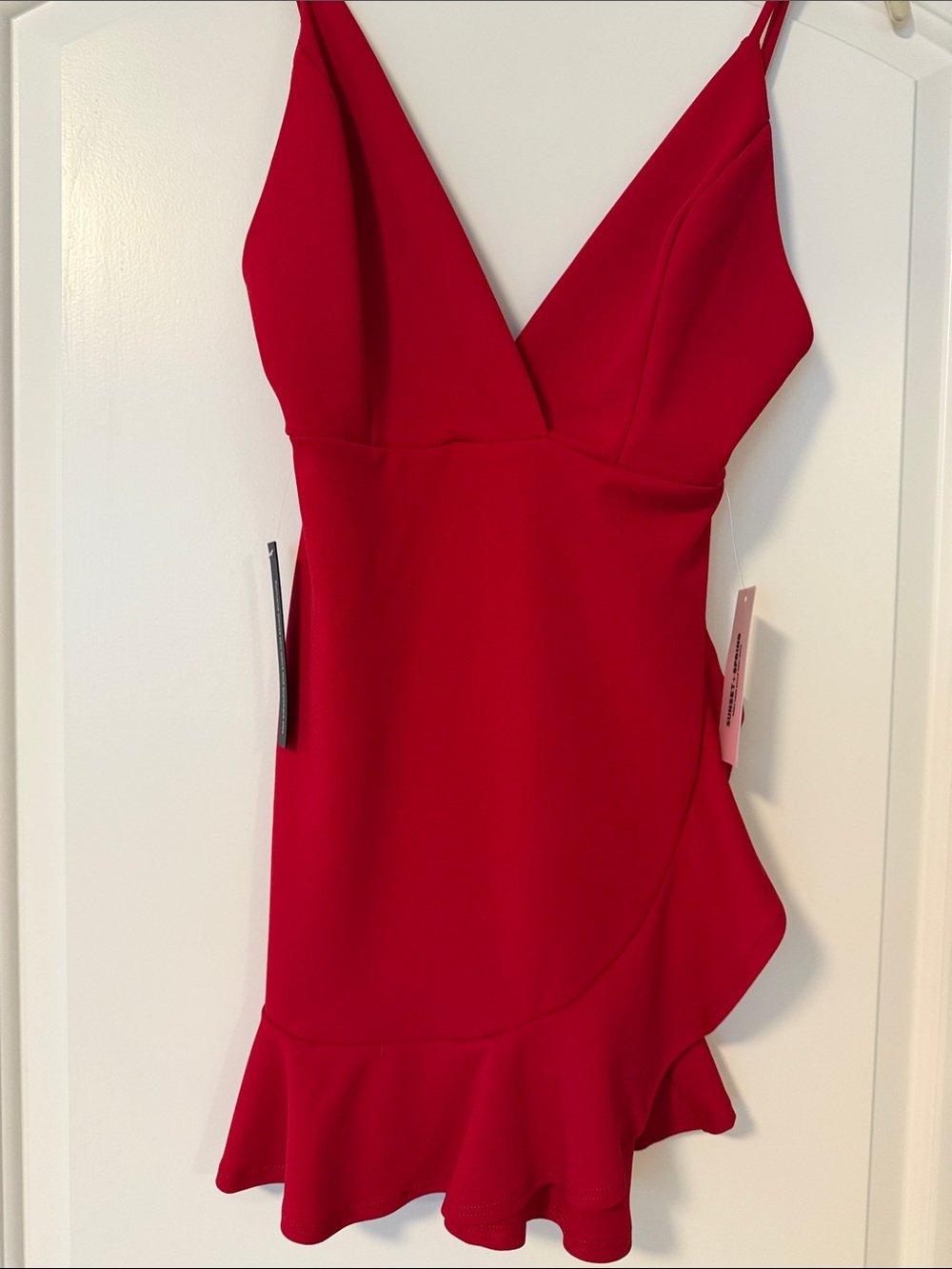 Sleeveless Red V-Neck Mini Dress with Ruffle Hem